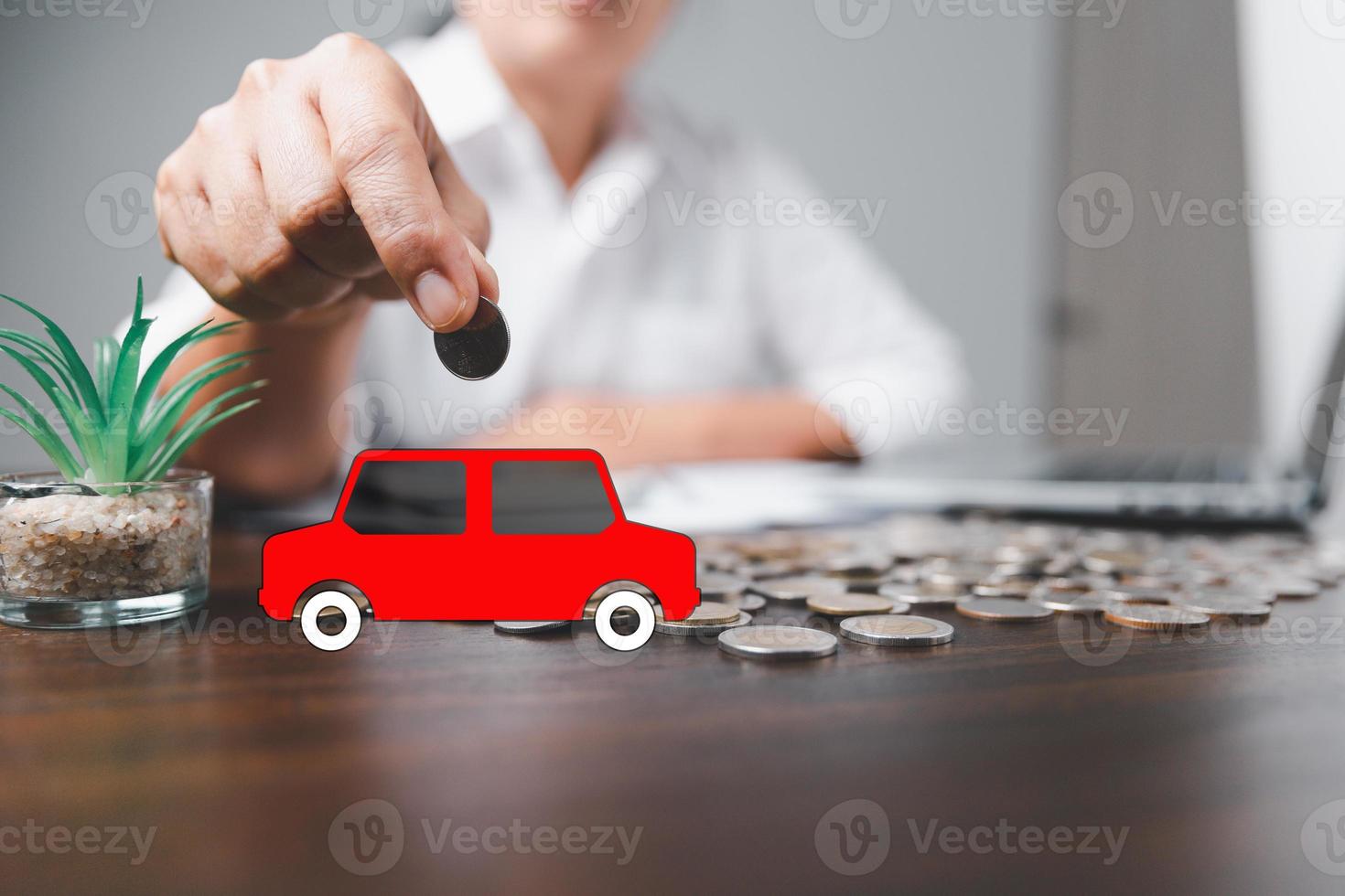 Concept of car insurance business, saving buy - sale with tax and loan for new car. Car toy vehicle with stack coin money on background. Planning to manage transportation finance costs. loan for car photo