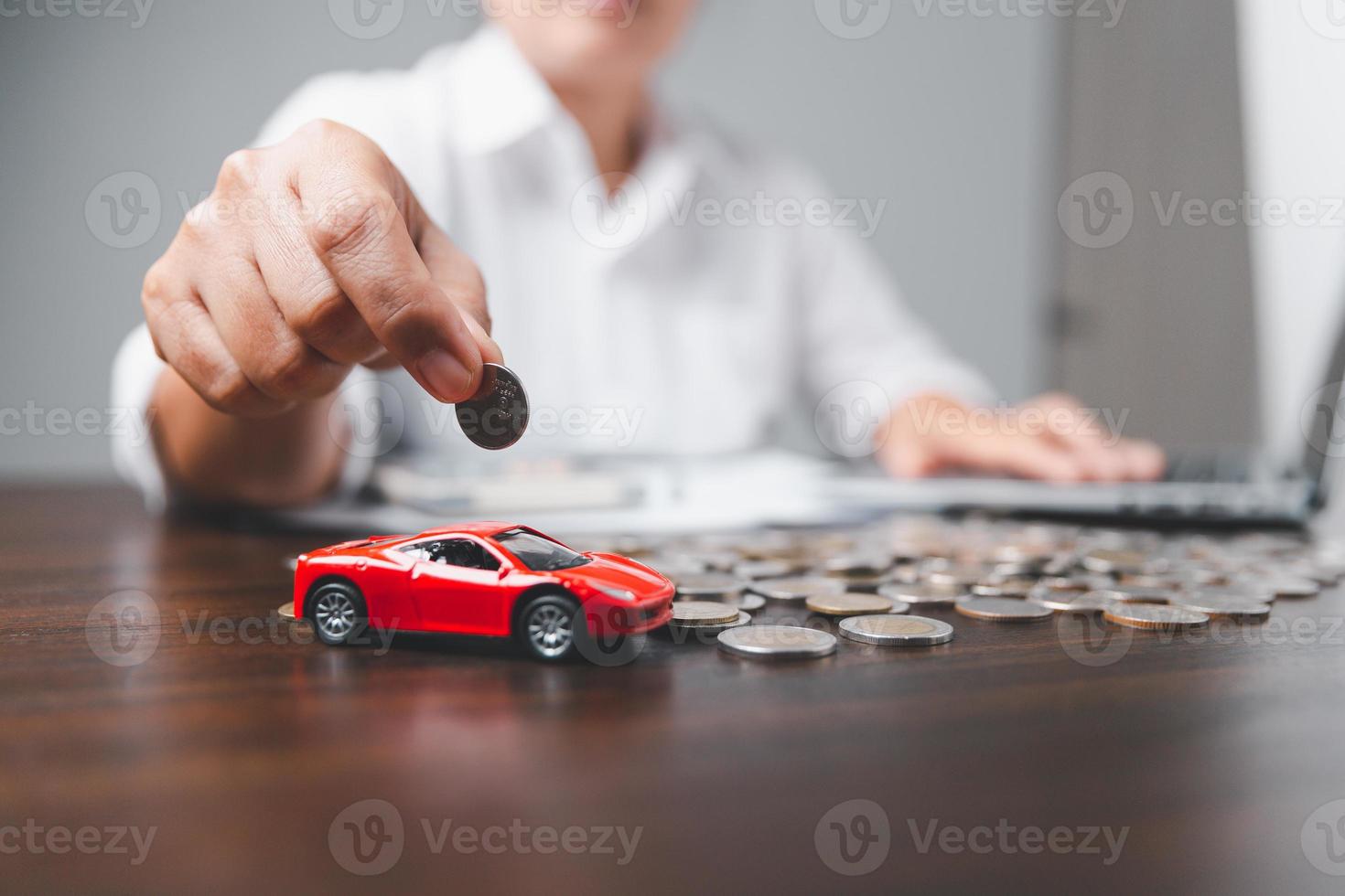 Concept of car insurance business, saving buy - sale with tax and loan for new car. Car toy vehicle with stack coin money on background. Planning to manage transportation finance costs. loan for car photo