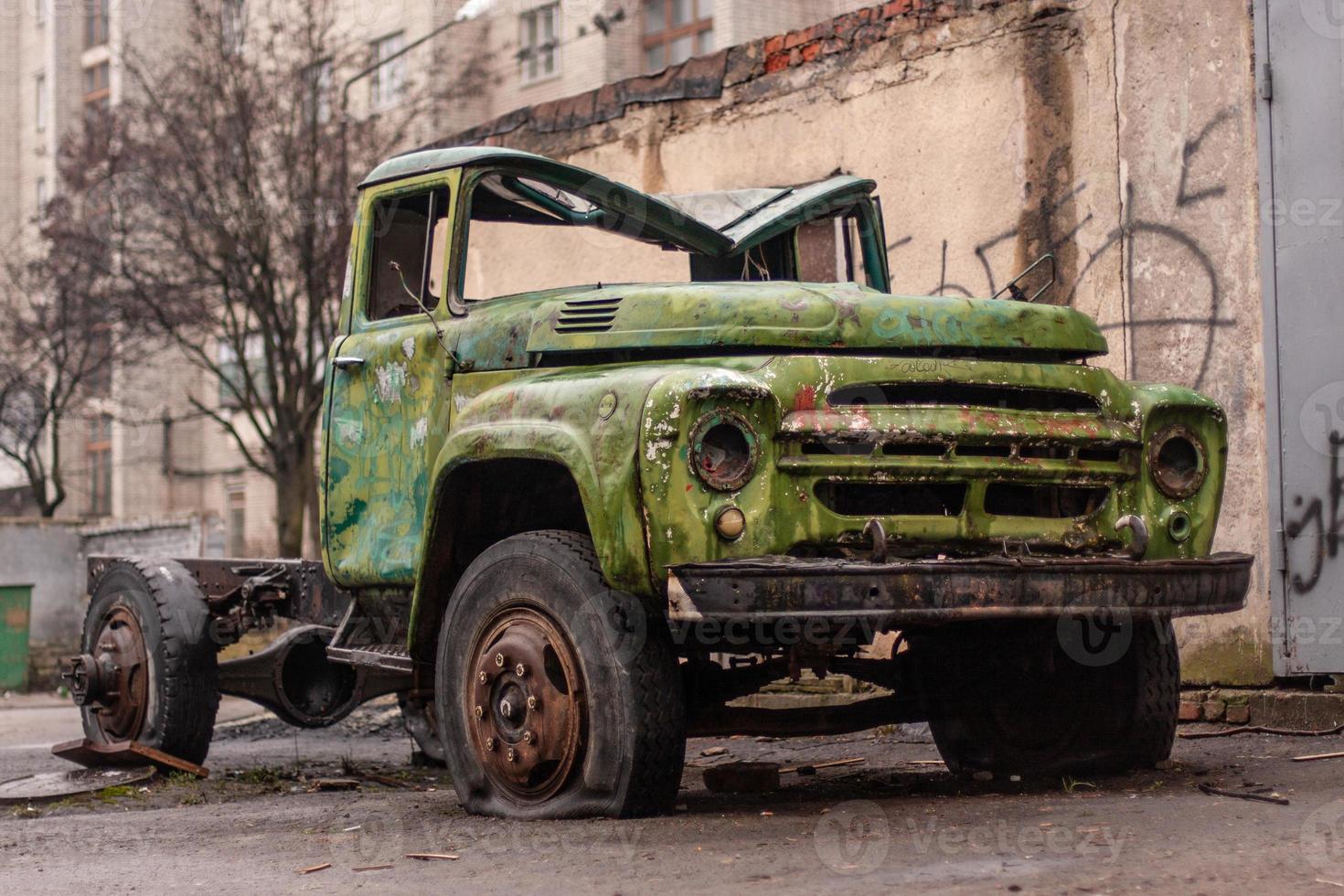 old abandoned rusty truck from the times of the Soviet Union. photo