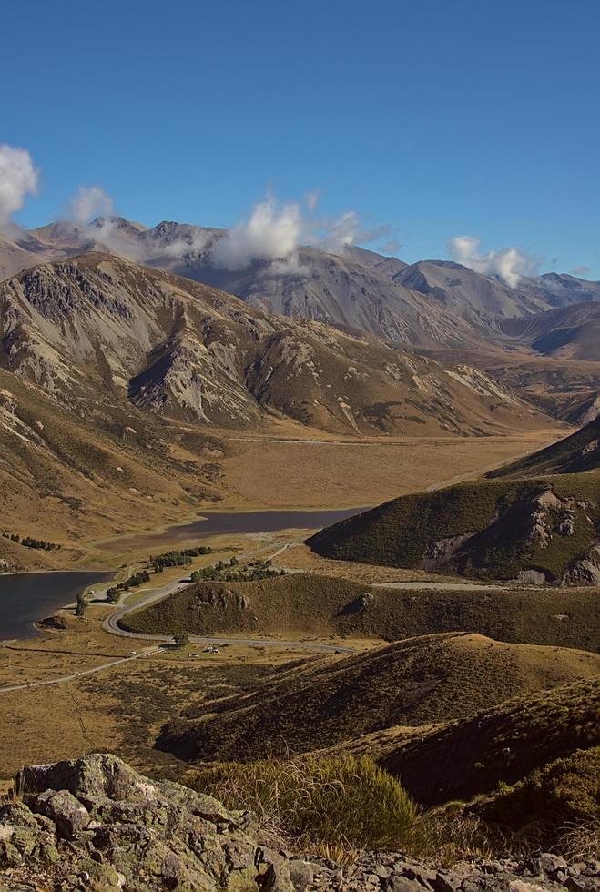 view of the valley and the clouds from the mountains photo