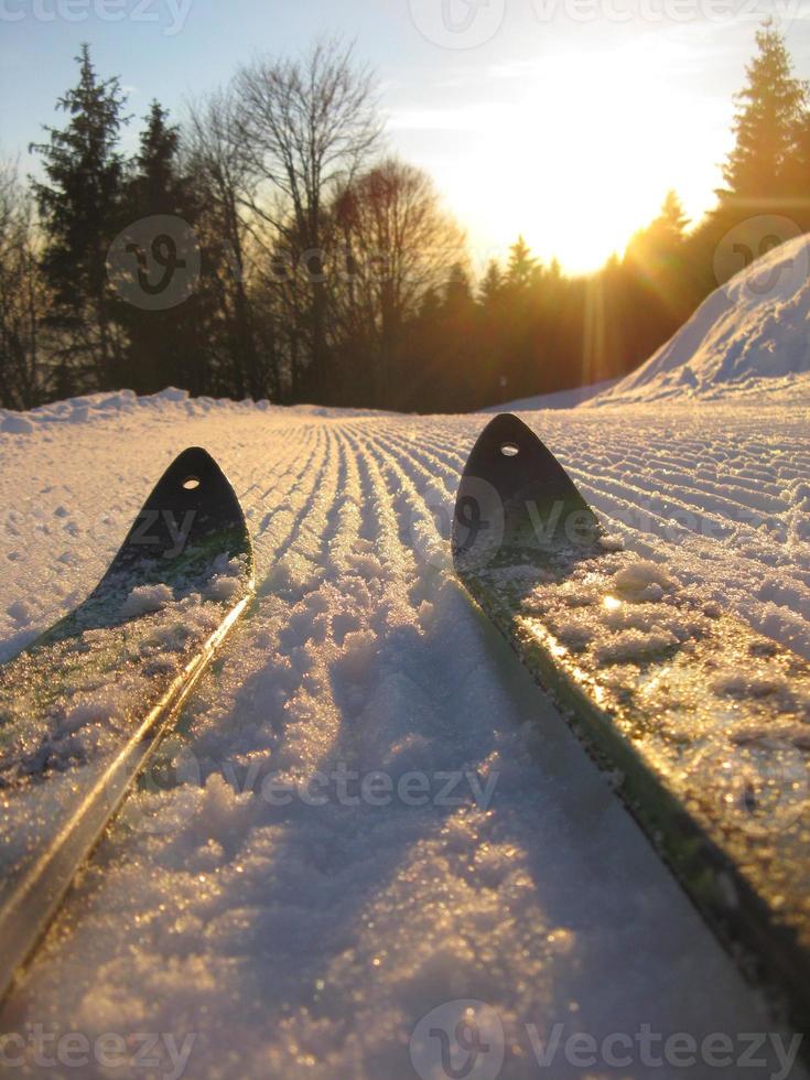 Newly milled ski slope with skis photo