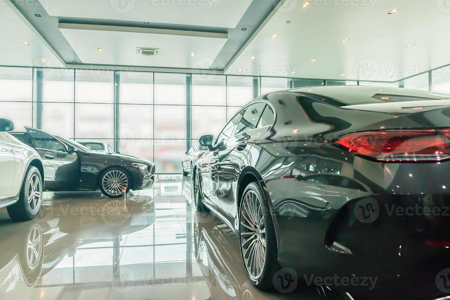 new car in the car dealership showroom photo