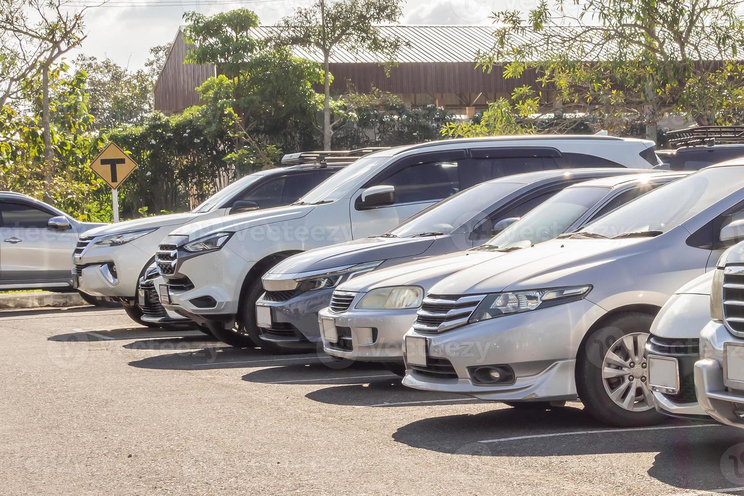 Cars parked in the outdoor parking lot photo