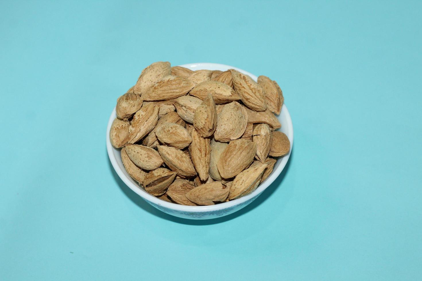 Different dried fruits and nuts on white background, top view. Space for text photo