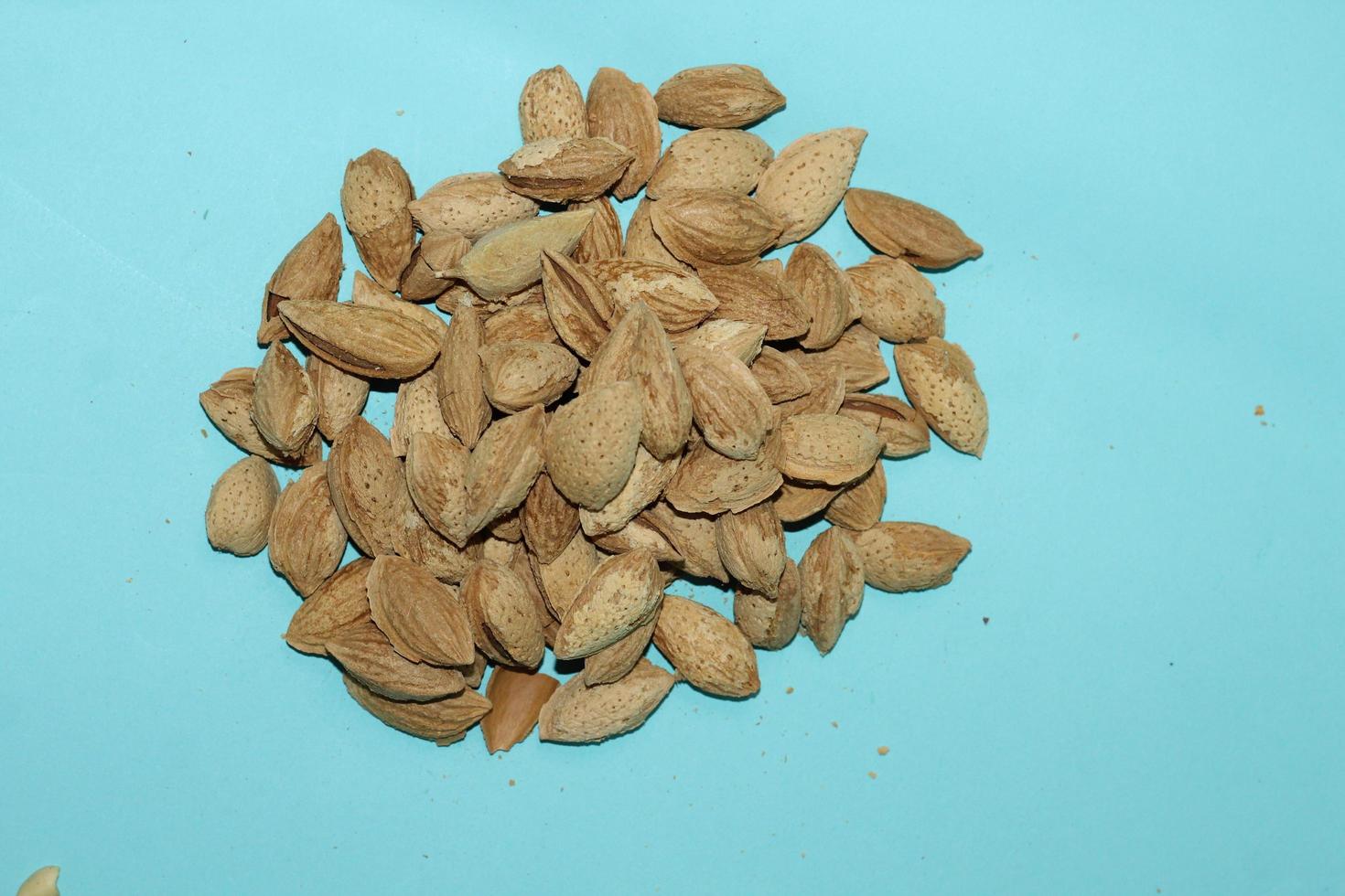 Different dried fruits and nuts on white background, top view. Space for text photo