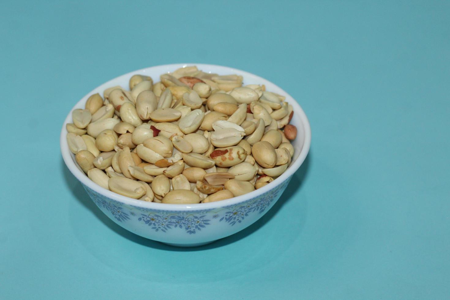 Different dried fruits and nuts on white background, top view. Space for text photo