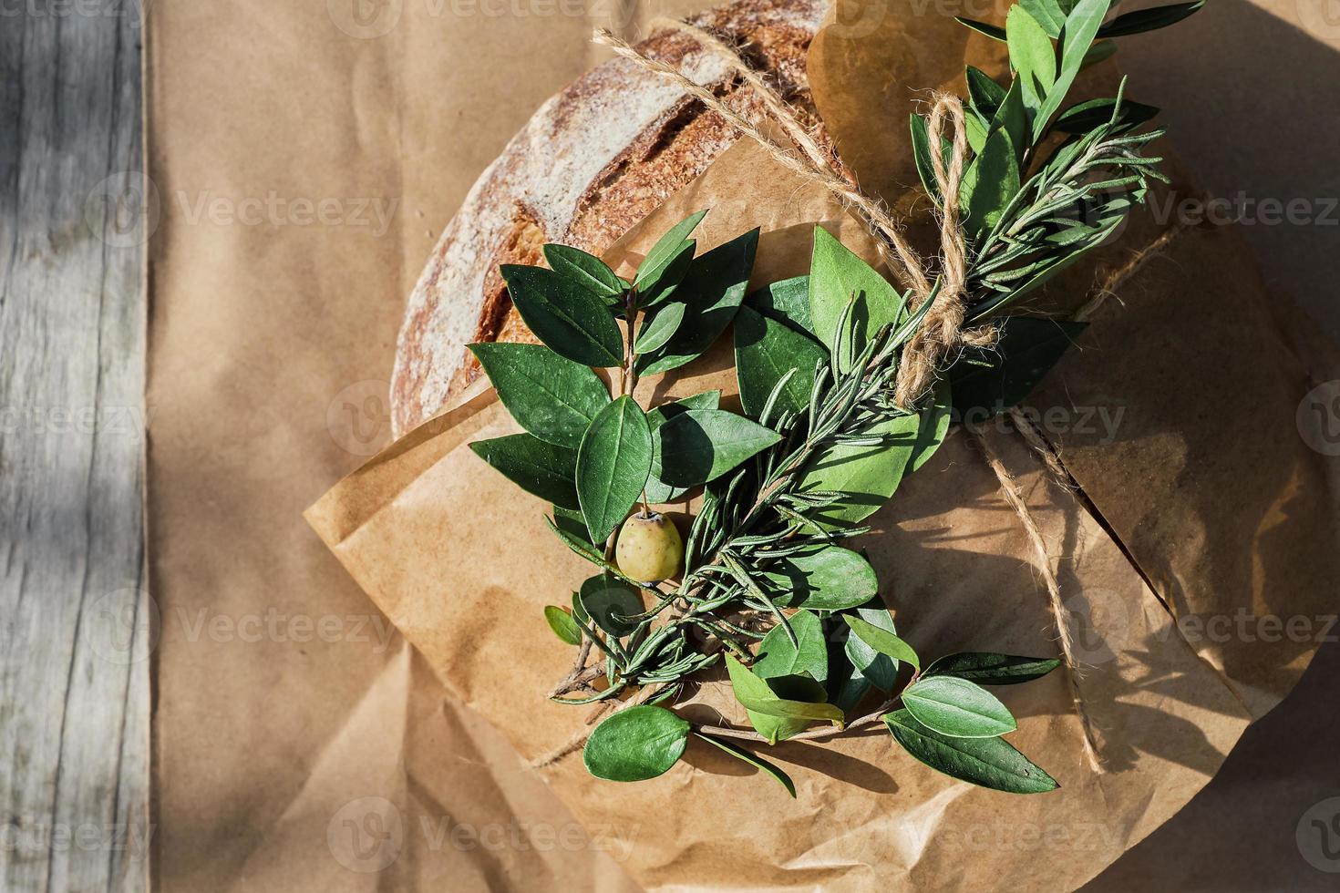 Top view of round freshly baked rustic rye bread. Christmas fair photo