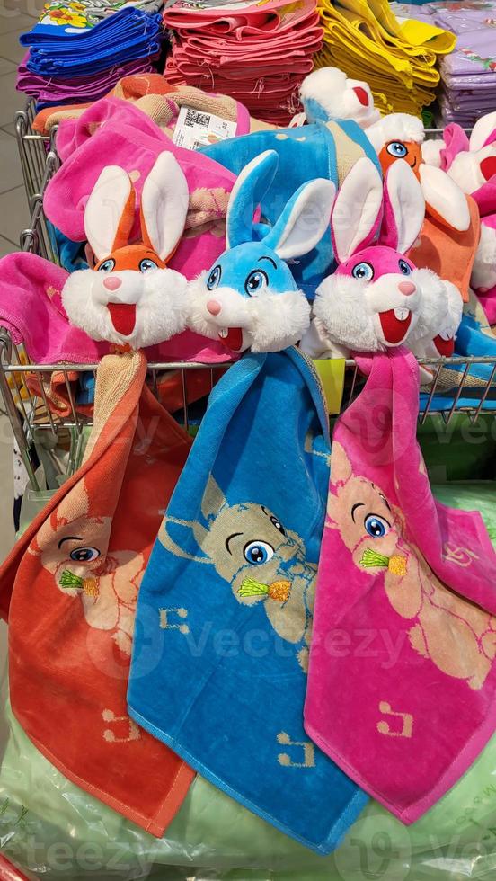 New Year and Easter design of Colorful fluffy hand Towels with rabbits photo