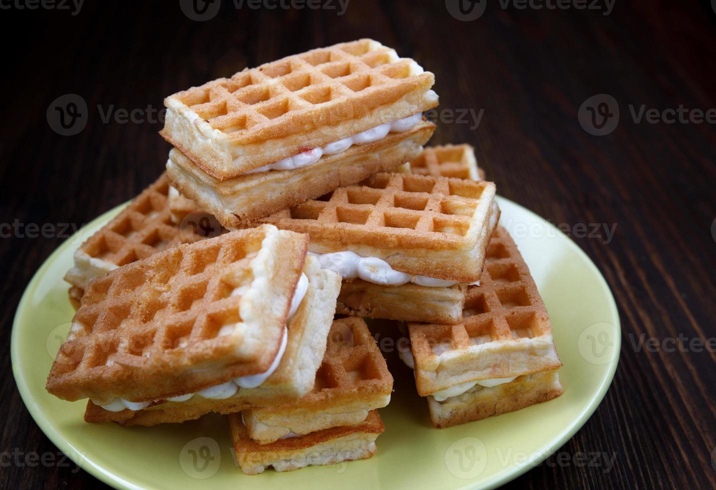 Viennese waffles on a yellow plate. Plate with Viennese waffles. photo