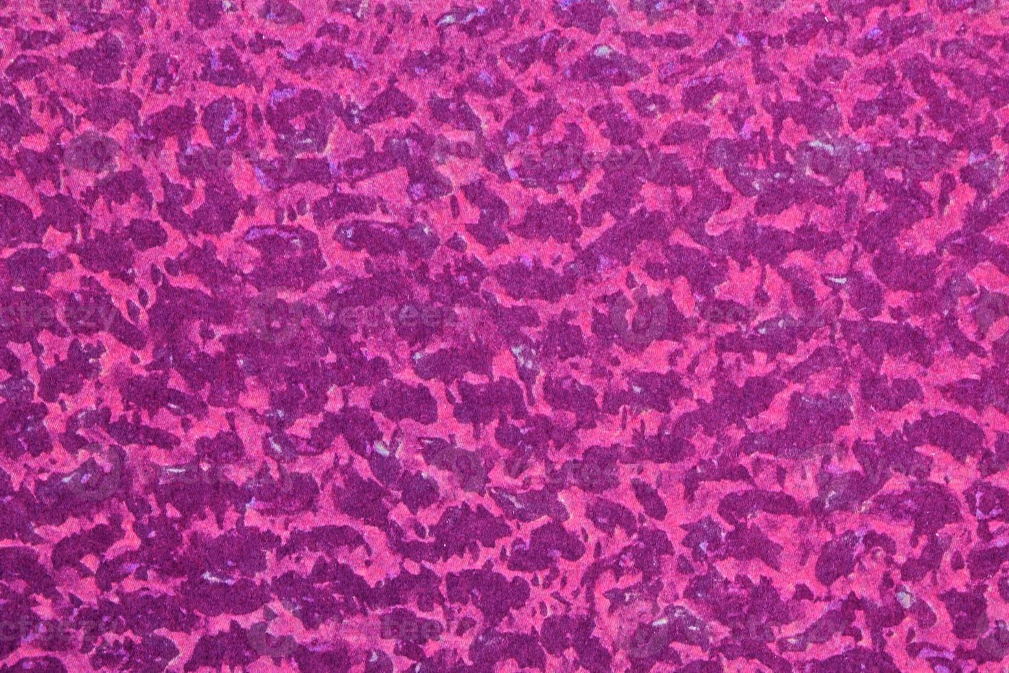 Abstract design background of arbitrary textured violet sale concept. Divorces and smooth lines of paint, colors. Bright fashion black and pink spots wallpaper pattern. Close-up, mock up, top view photo