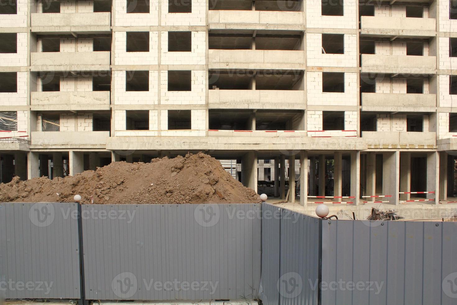 Windows of building on new residential area construction site. Industry modern civil house business. Concept of development improvement town. Architecture planning of a city. Renovation project. photo