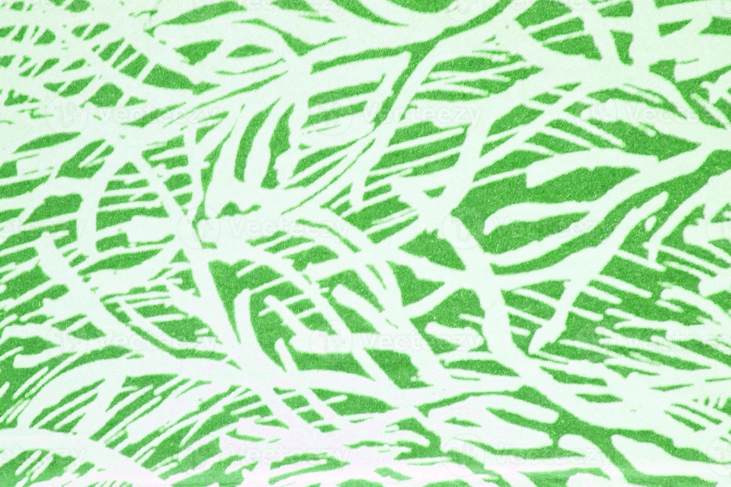 Abstract paper white geometric asymmetrical texture striped surface line on green background. Structure design cardboard shape backdrop. Decoration spring interior concept. Flatlay, close-up, top view photo