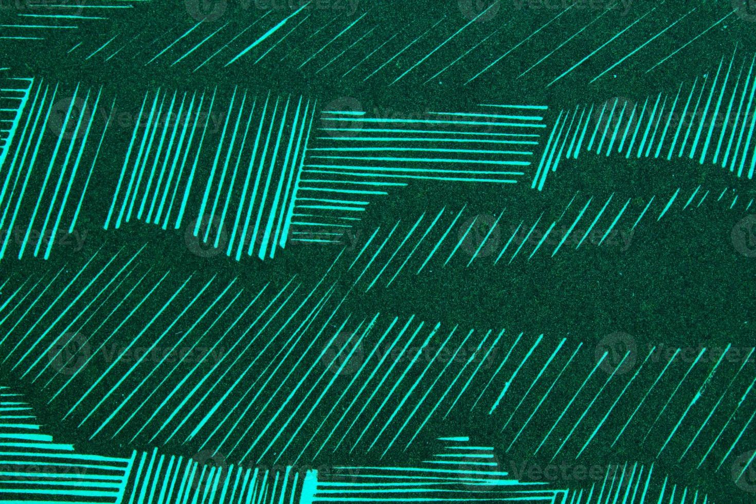 Abstract paper emerald geometric asymmetrical texture striped surface lines background. Structure design cardboard shape backdrop. Decoration holiday interior concept. Flatlay, close-up, top view photo