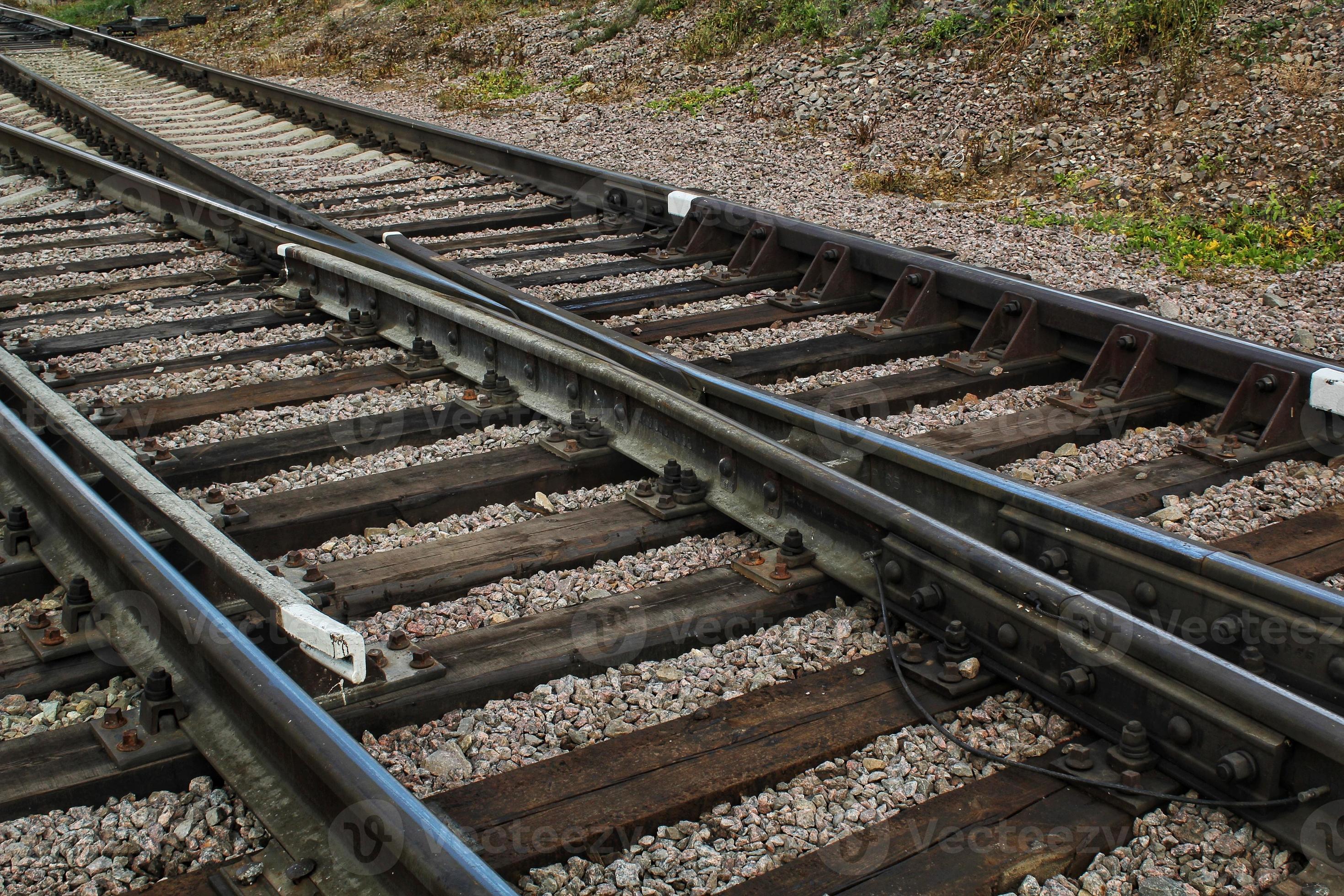 Railway line junction tracks. Railroad travel, tourism.Transportation concept. Iron detail over