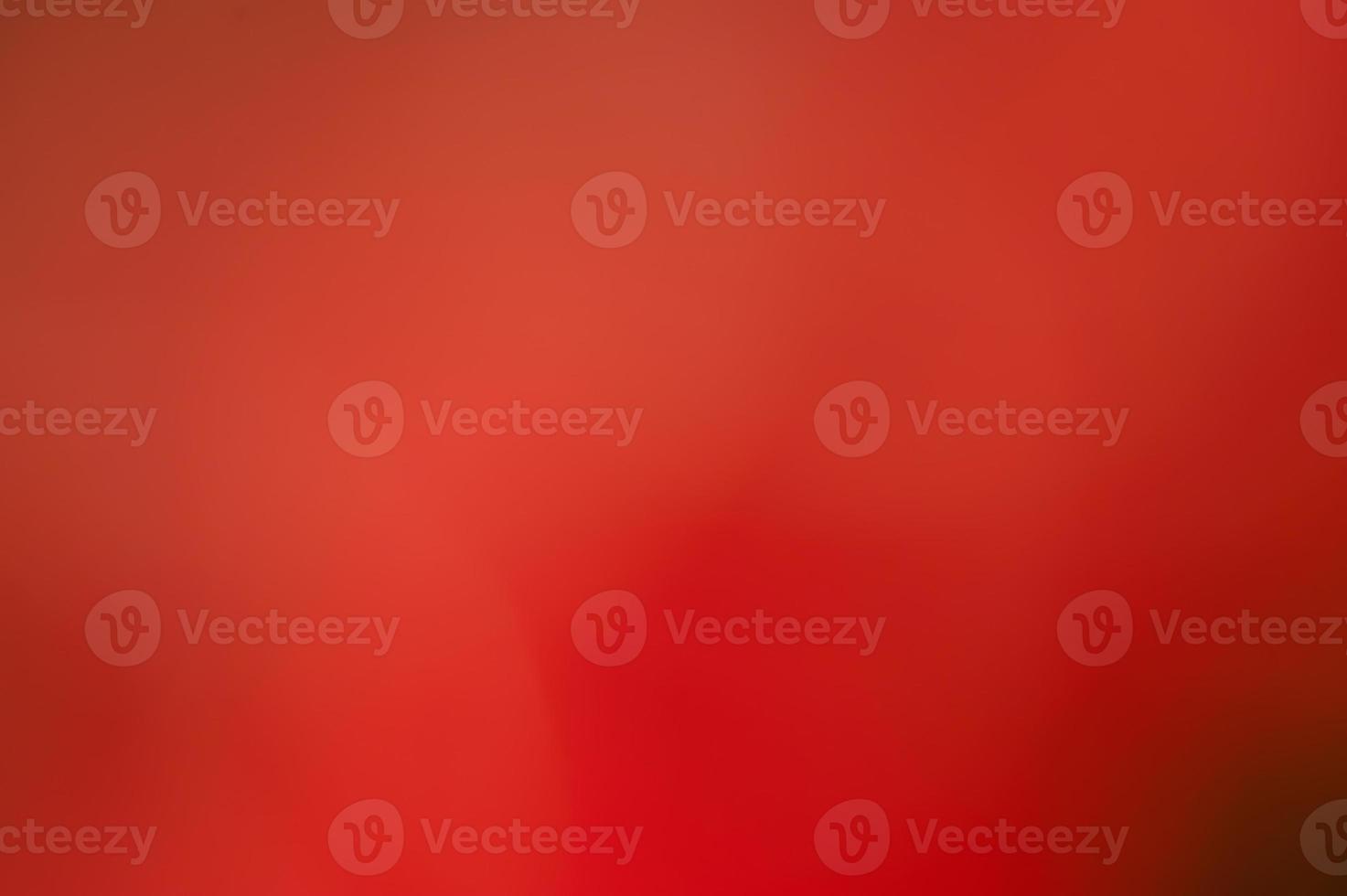 Abstract red defocused background. Blurred background red with black. photo