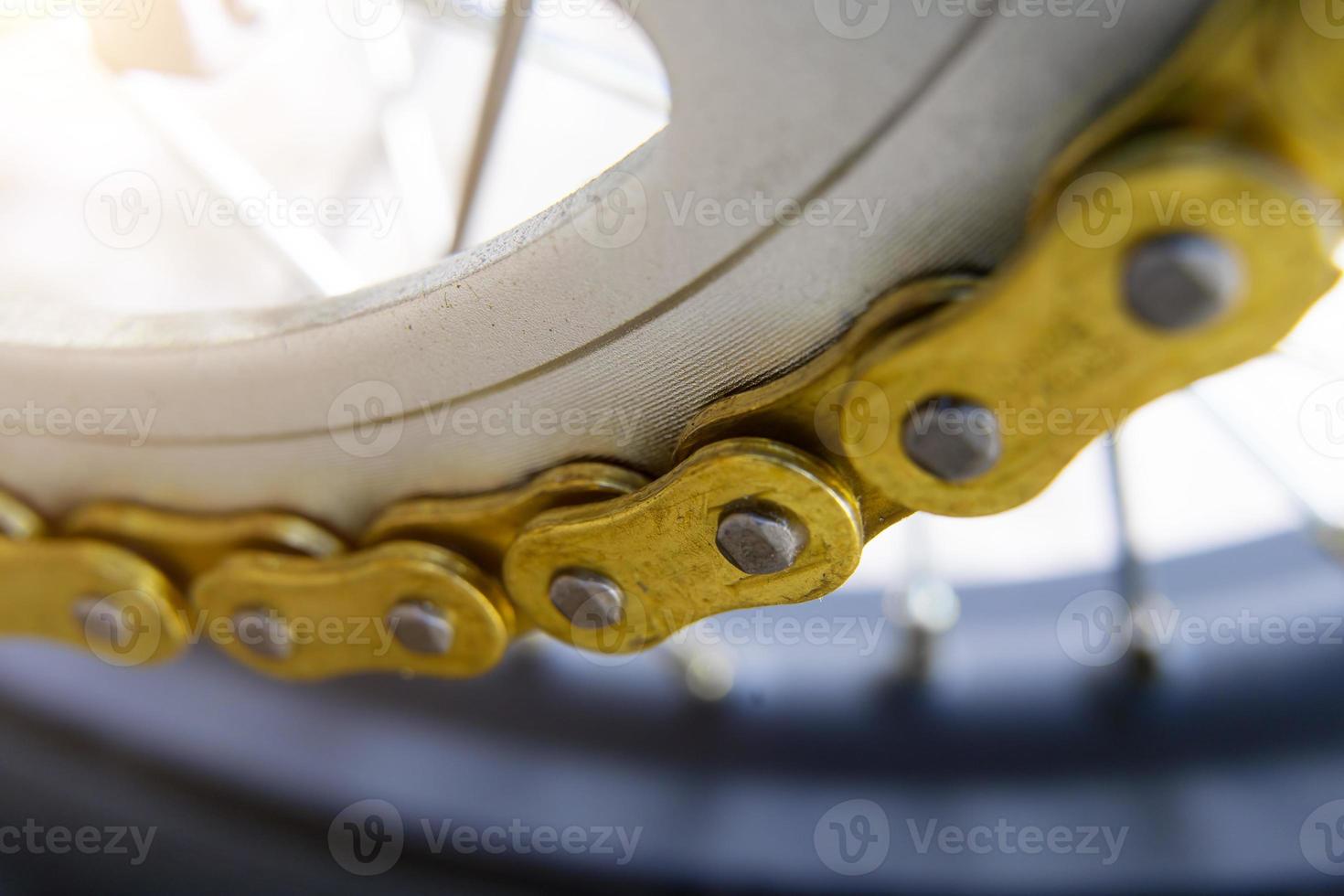 gold chain motorcycle close-up macro photo