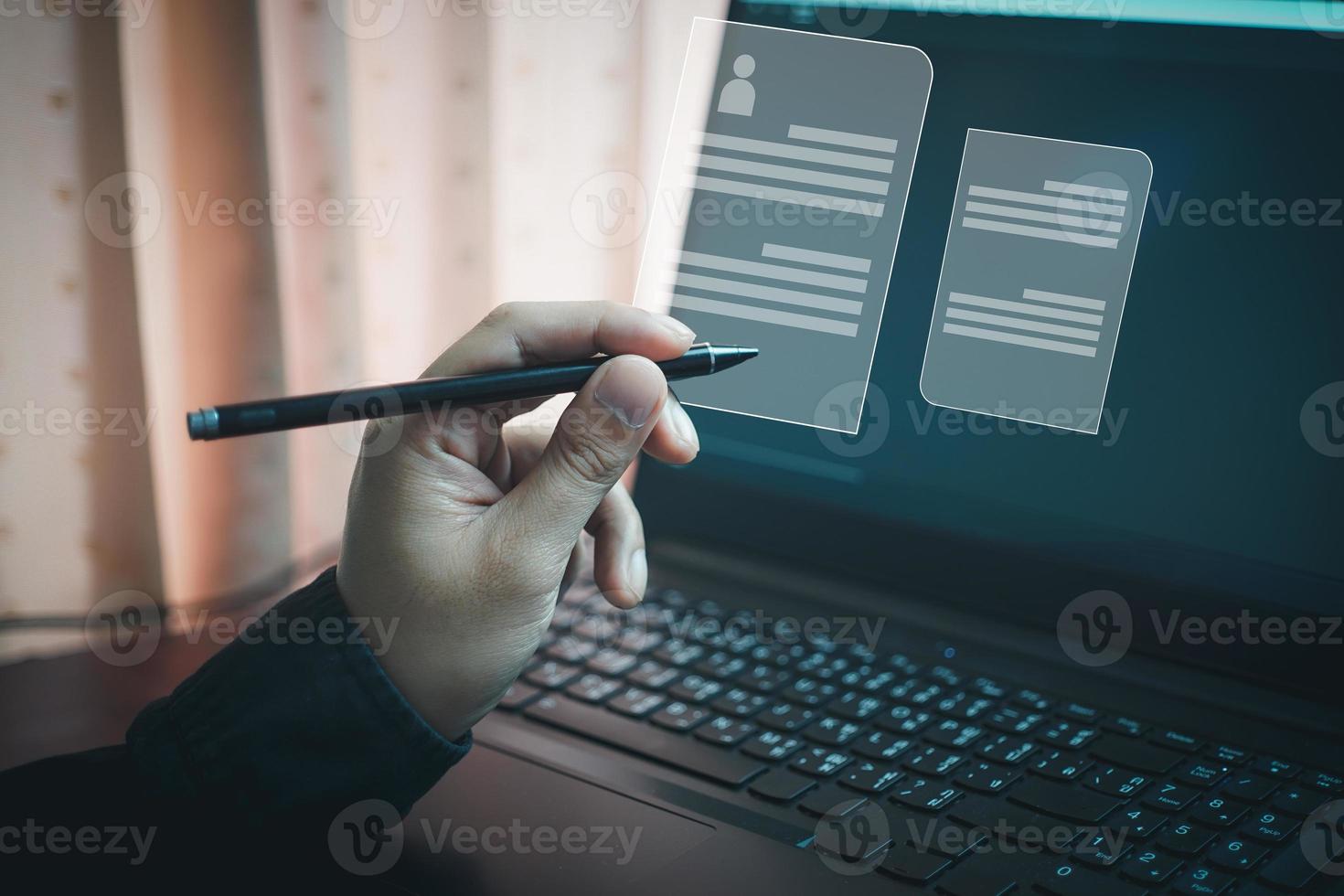 Electronic signature and paperless office concept. A businessman uses a pen to sign electronic documents on digital documents on a virtual screen. photo