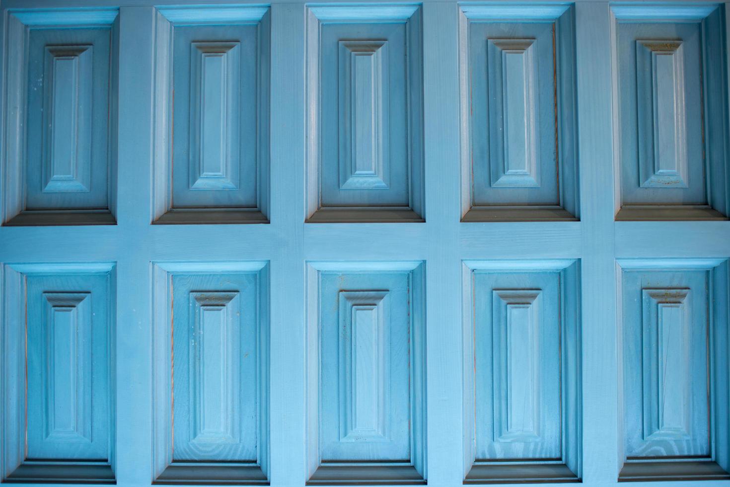 Background. Close up of a wooden door with a traditional pattern photo