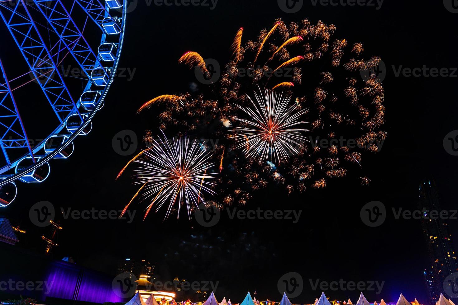 fireworks on the river in the dark sky photo