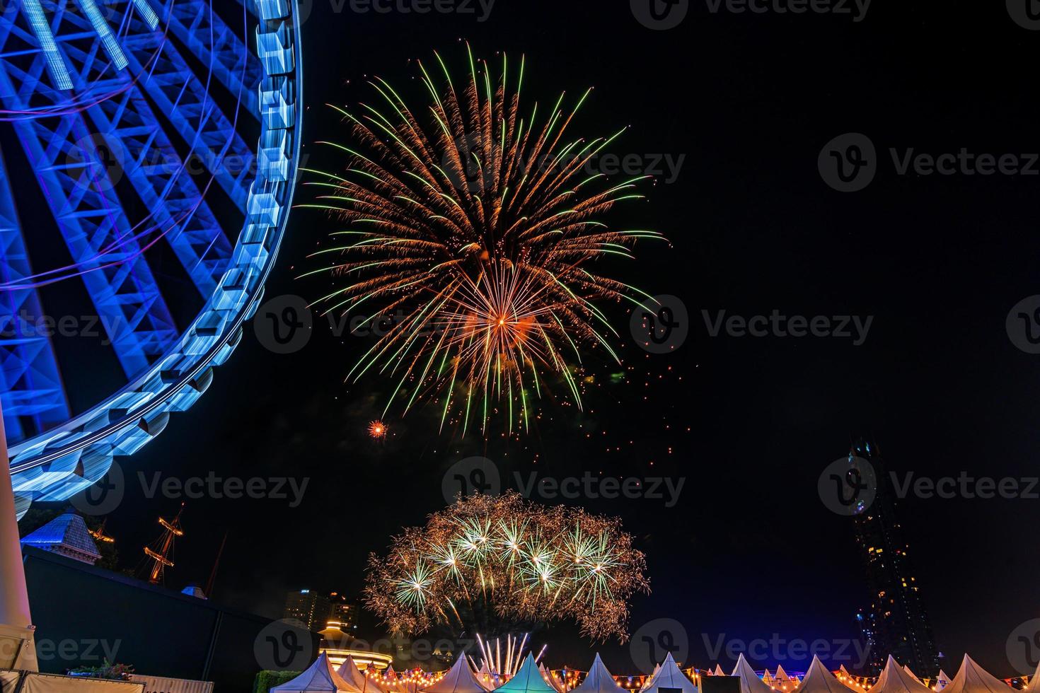 fireworks on the river in the dark sky photo