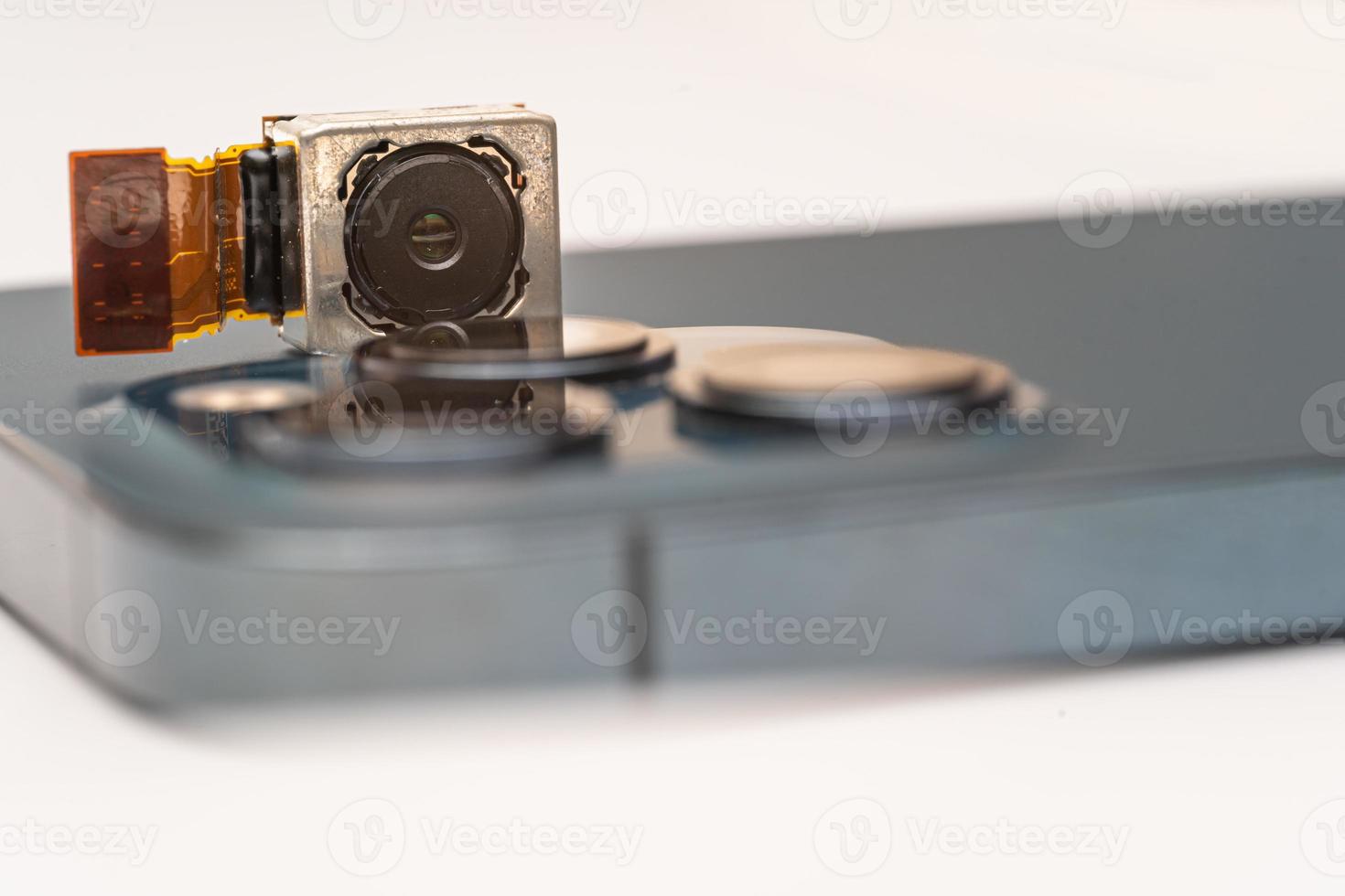 camera modules being used in mobile phones. development of mobile cameras. Digital camera lens part. sensor and technology smartphone new high resolution cameras. Mobile phone camera module photo