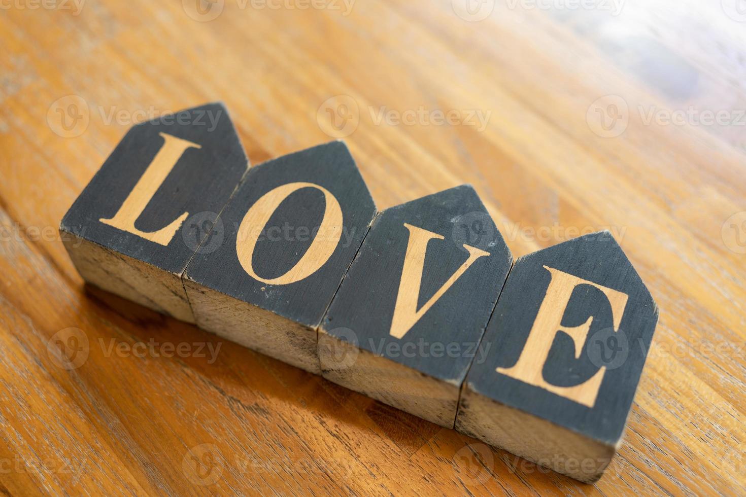 Word love. Love blocks. The word love formed with small wooden blocks. selective focus. photo