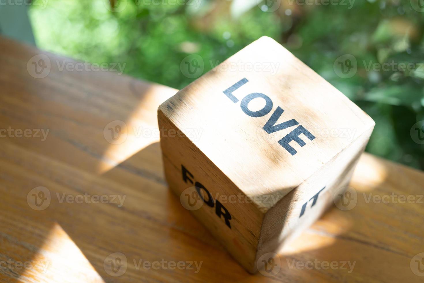 Word love. Love blocks. The word love formed with small wooden blocks. selective focus. photo