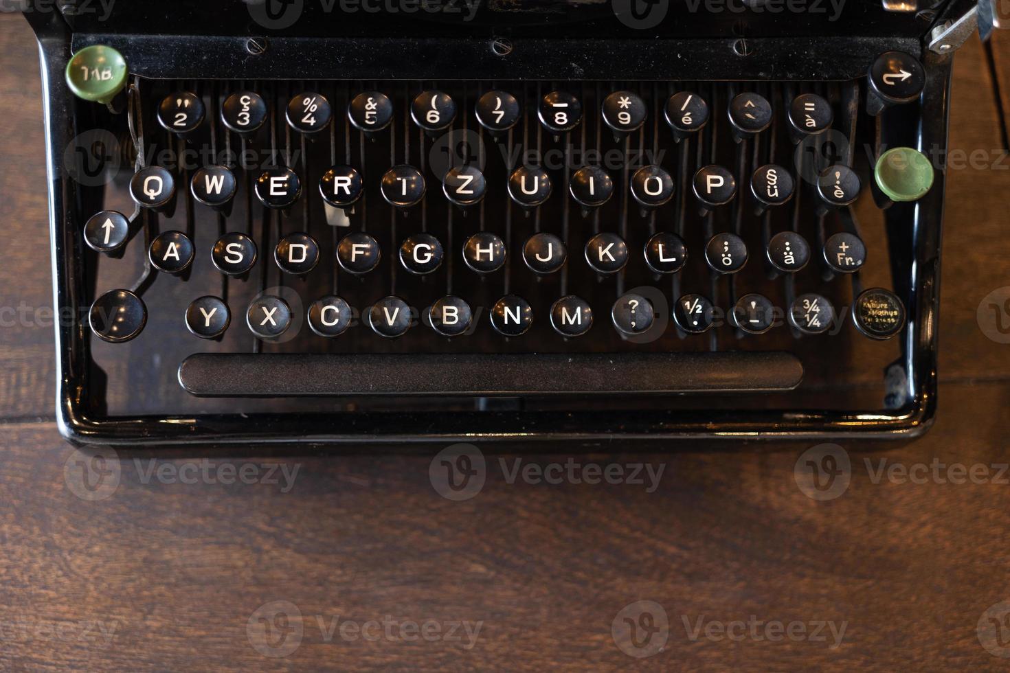 vintage typewriter keys with selective focus. Antique Typewriter. Vintage Typewriter Machine Closeup Photo. photo