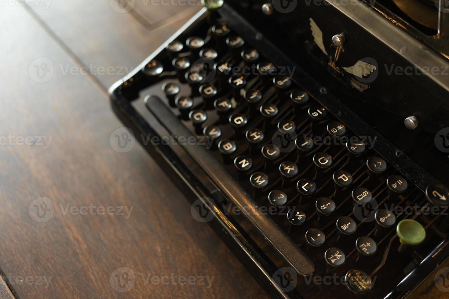 vintage typewriter keys with selective focus. Antique Typewriter. Vintage Typewriter Machine Closeup Photo. photo