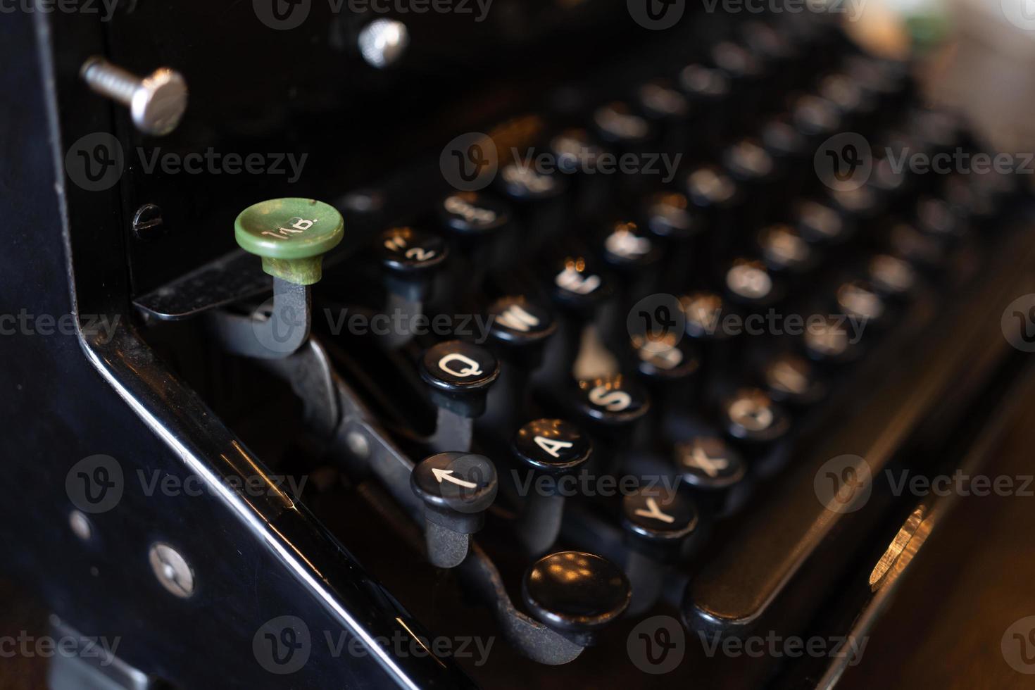 vintage typewriter keys with selective focus. Antique Typewriter. Vintage Typewriter Machine Closeup Photo. photo