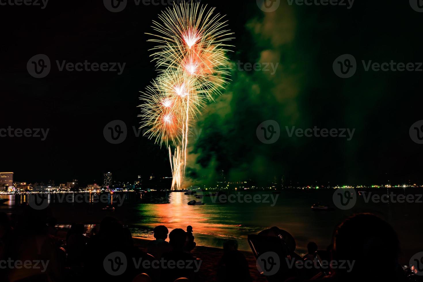 Abstract colored firework background light up the sky with dazzling display photo