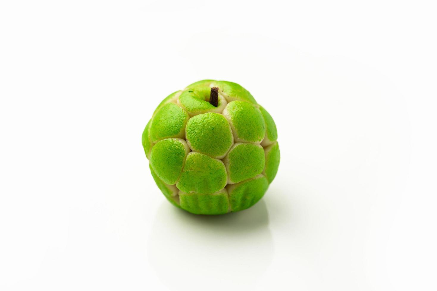 Sitafal peda or pera or custard apple shape designer sweet mithai barfi or burfi photo