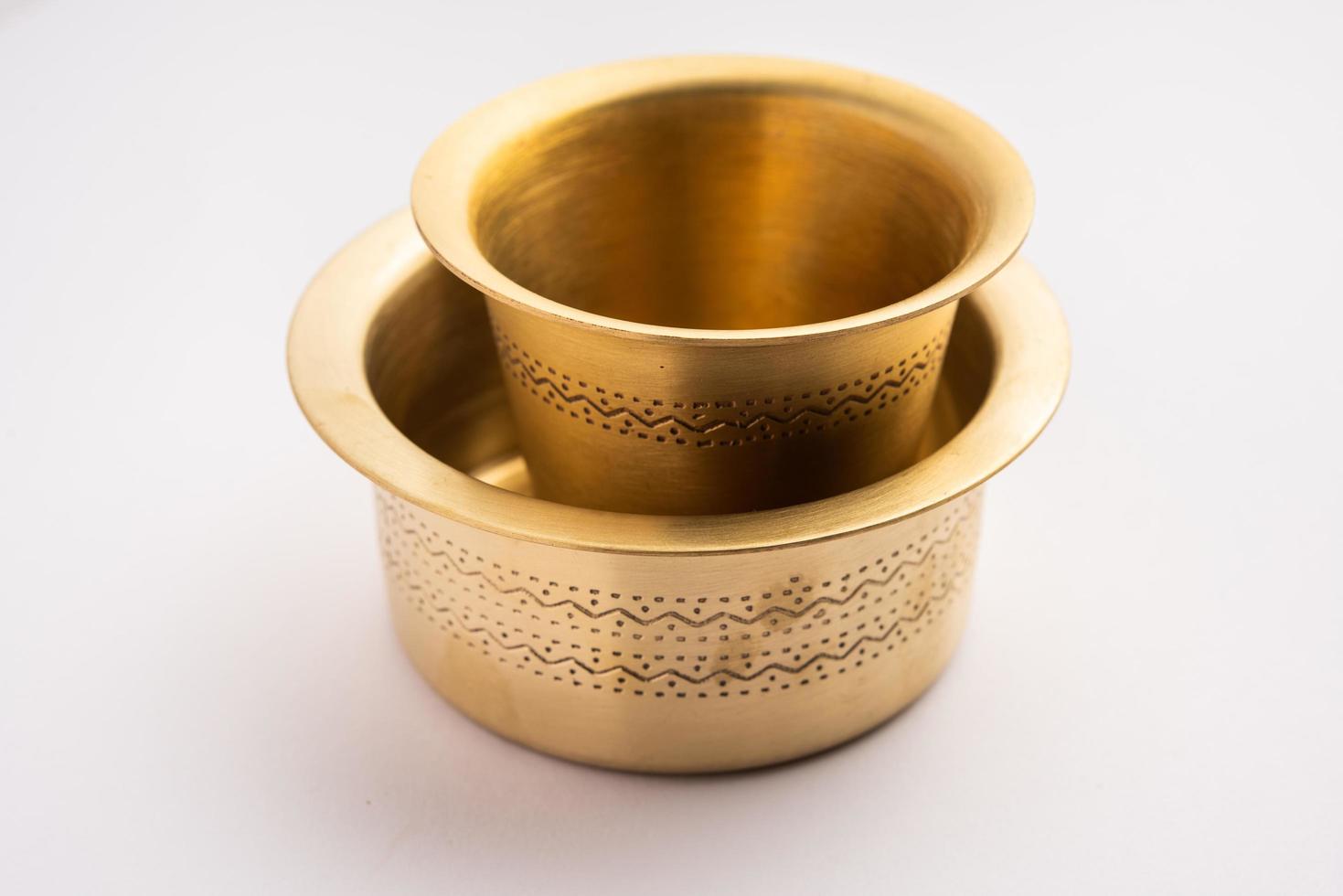 South Indian filter Coffee or tea Brass or stainless steel empty Tumbler Cup and saucer or glass photo