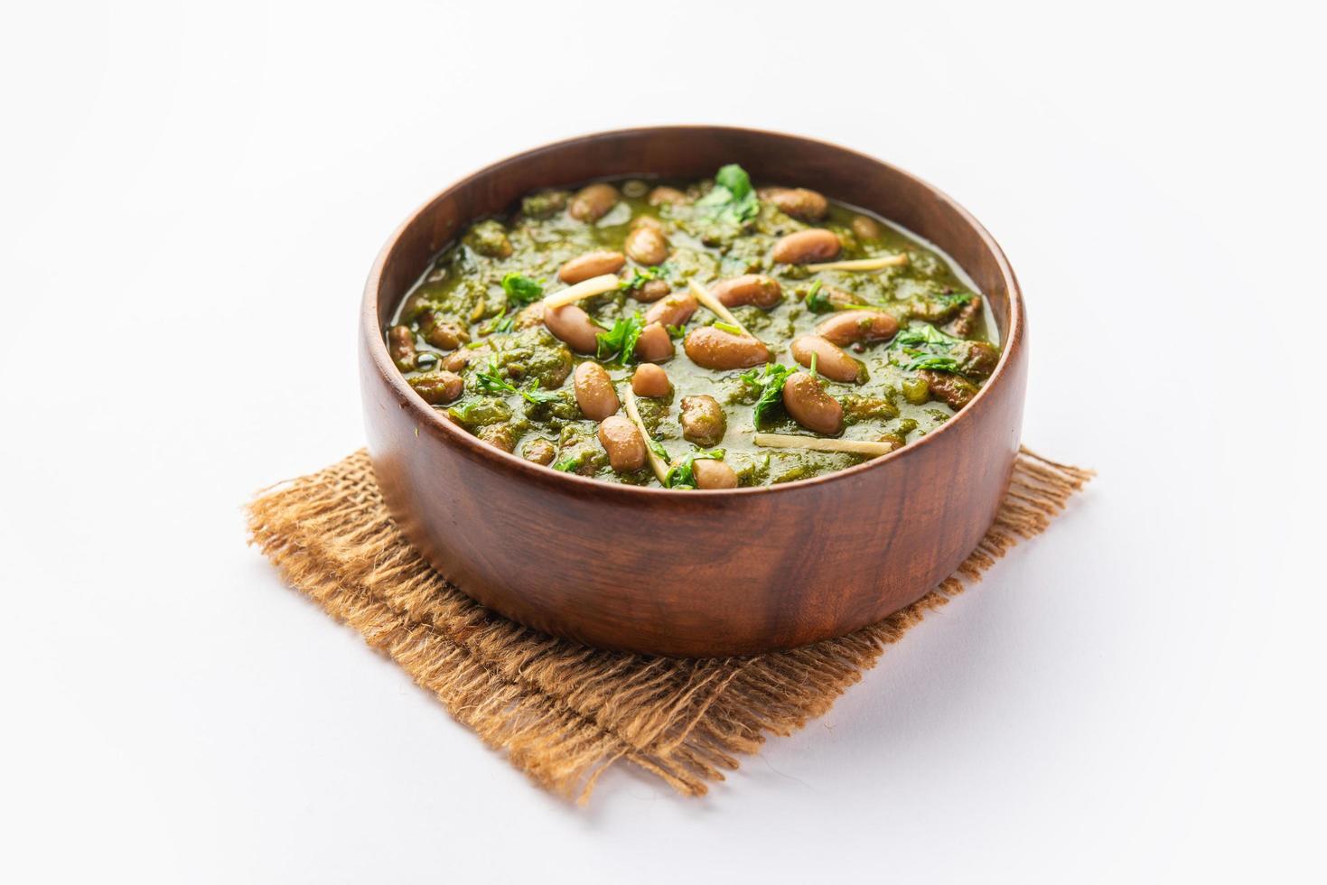 Palak rajma Masala is an Indian curry prepared with red kidney beans and spinach cooked with spices photo