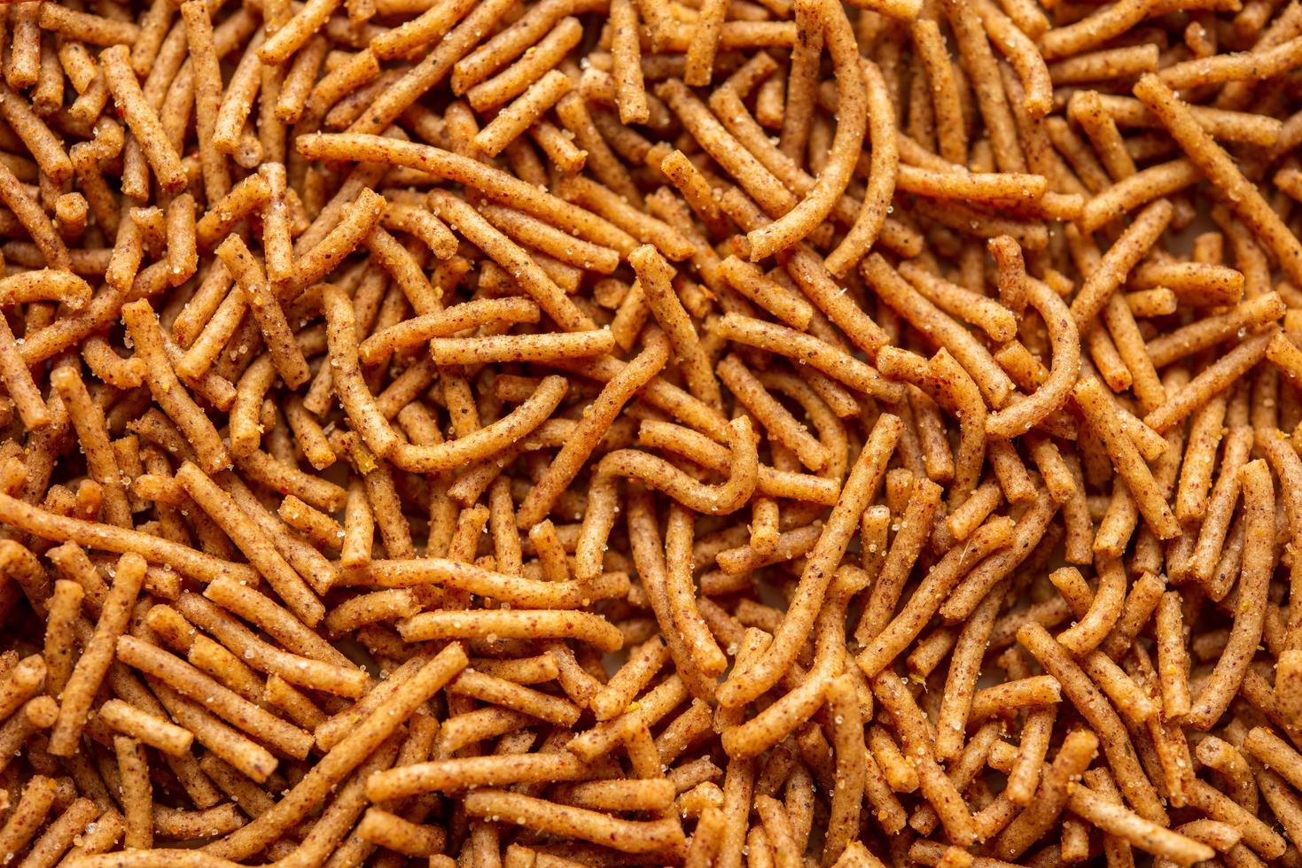 Nachni or Ragi Sev is a delicious crispy noodle made from finger millets, healthy Indian food photo