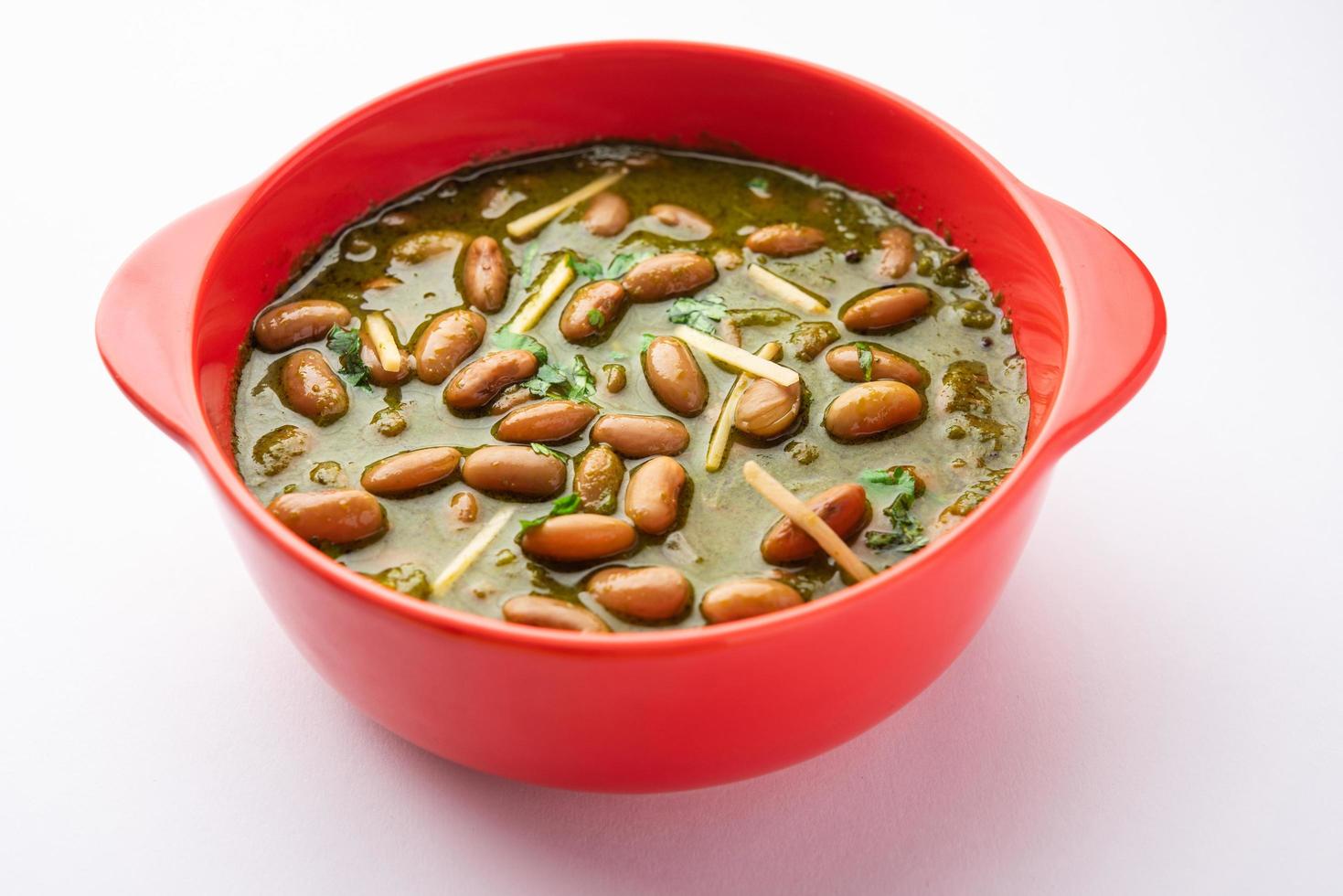 Palak rajma Masala is an Indian curry prepared with red kidney beans and spinach cooked with spices photo