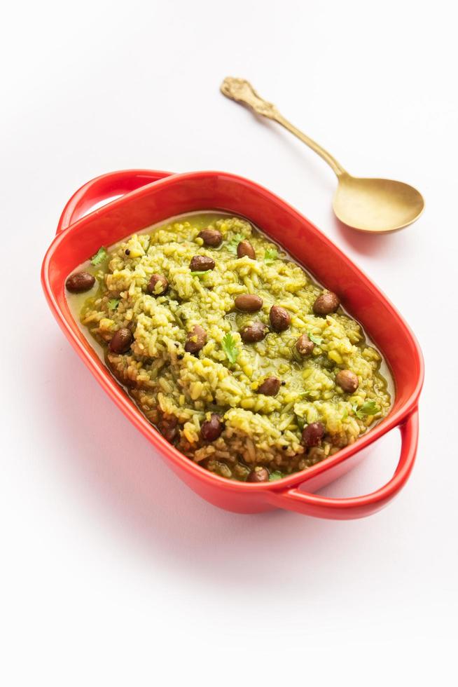Palak khichdi is a one pot nutritious meal of mung lentils and rice with spinach, Indian food photo
