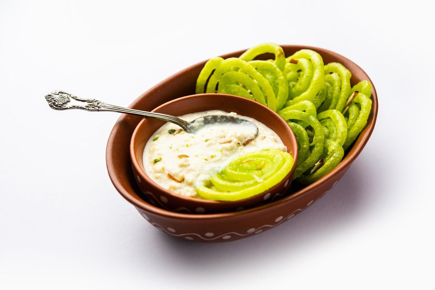 Rabdi Jalebi - Green jilebi or imarati with Rabri made from condensing milk, Indian dessert photo