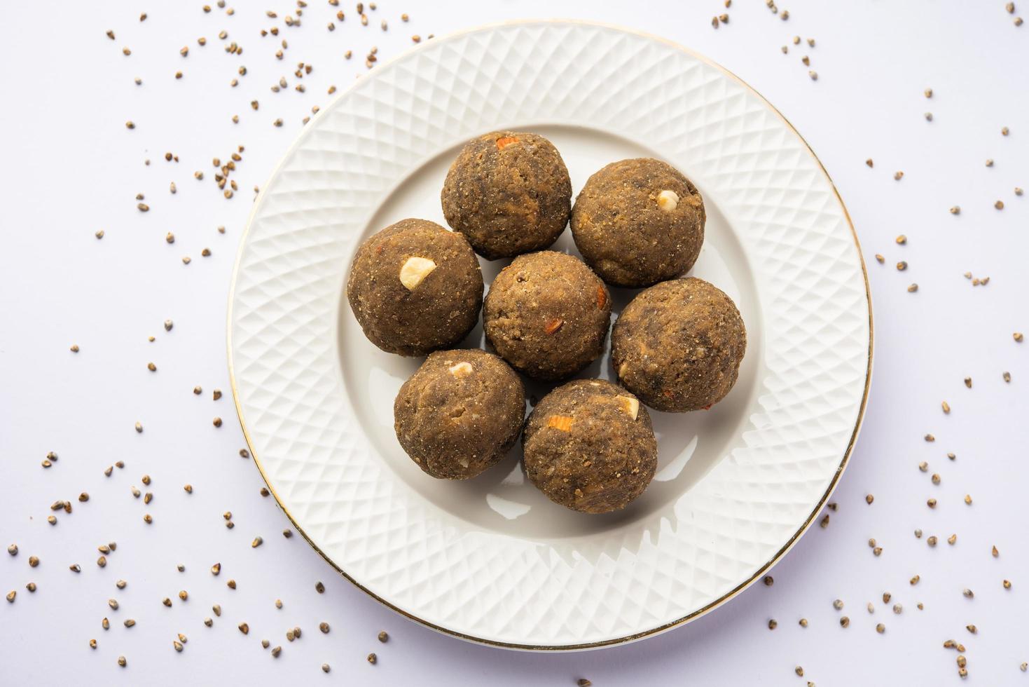 Bajra Atta Ladoo or kuler laddoo - Millet Flour Laddu, a popular winter sweet snack food from India photo