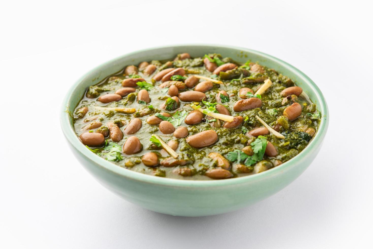 Palak rajma Masala is an Indian curry prepared with red kidney beans and spinach cooked with spices photo