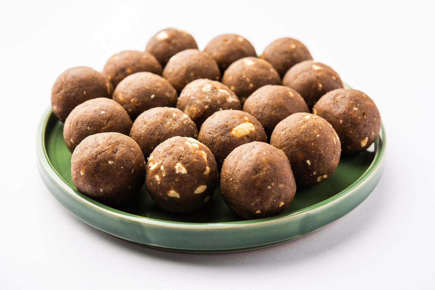 Fenugreek or methi ke Laddu, laddo or laddoo or sweet mithai balls for boosting immunity in winters photo