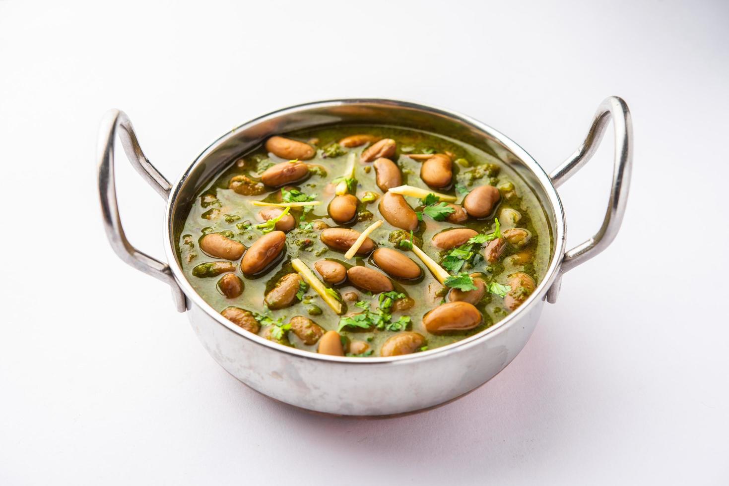 Palak rajma Masala is an Indian curry prepared with red kidney beans and spinach cooked with spices photo