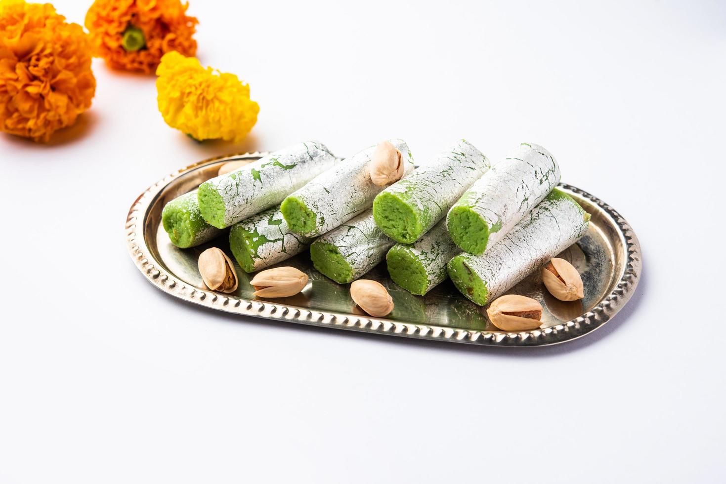 Pista Roll Or Pistachio Rolls Mithai or sigar, Indian sweet or dessert for festivals photo