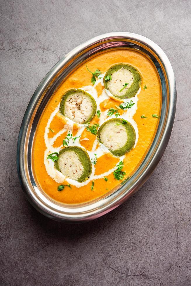 Shaam Savera is a spinach kofta curry where stuffing is made from paneer and the kofta made from spinach photo