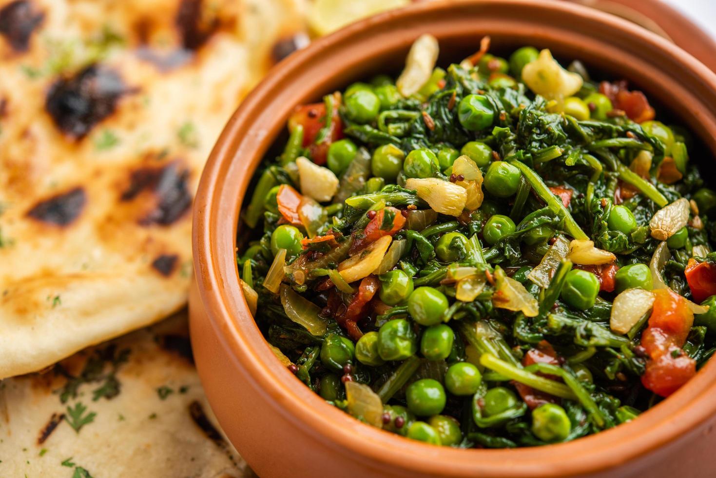 palak matar curry also known as spinach geen peas masala sabzi or sabji, indian food photo