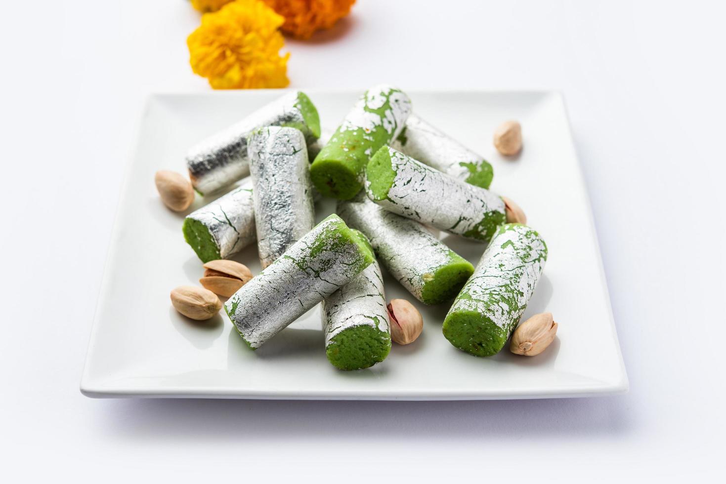 Pista Roll Or Pistachio Rolls Mithai or sigar, Indian sweet or dessert for festivals photo