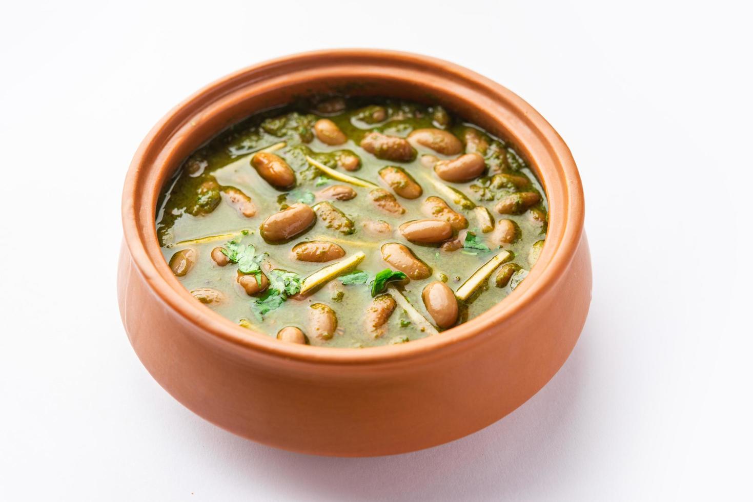 Palak rajma Masala is an Indian curry prepared with red kidney beans and spinach cooked with spices photo