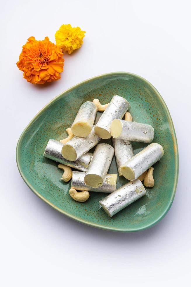 Kaju Roll mithai - A royal Traditional sweet made from cashew powder and mawa with sugar photo
