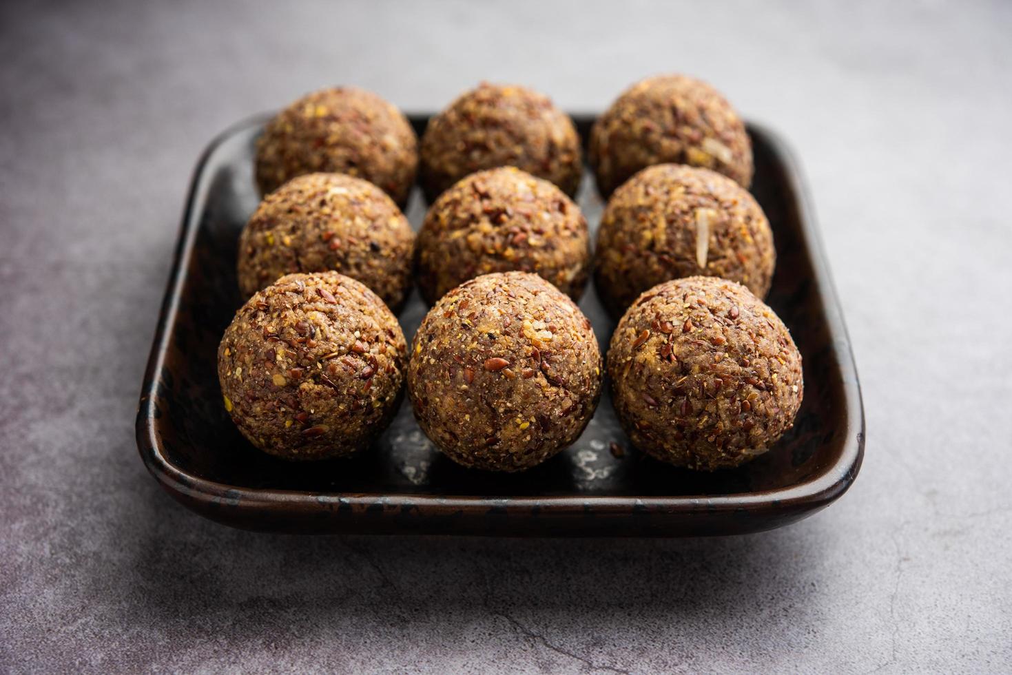 Alsi pinni laddu or flax seed laddo or healthy jawas ladoo are delicious Indian sweet energy balls photo