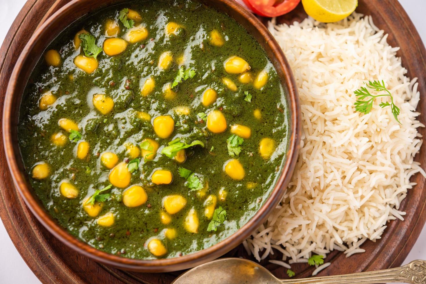Palak sweet corn sabzi also known as Spinach Makai curry sabji, north Indian main course menu photo